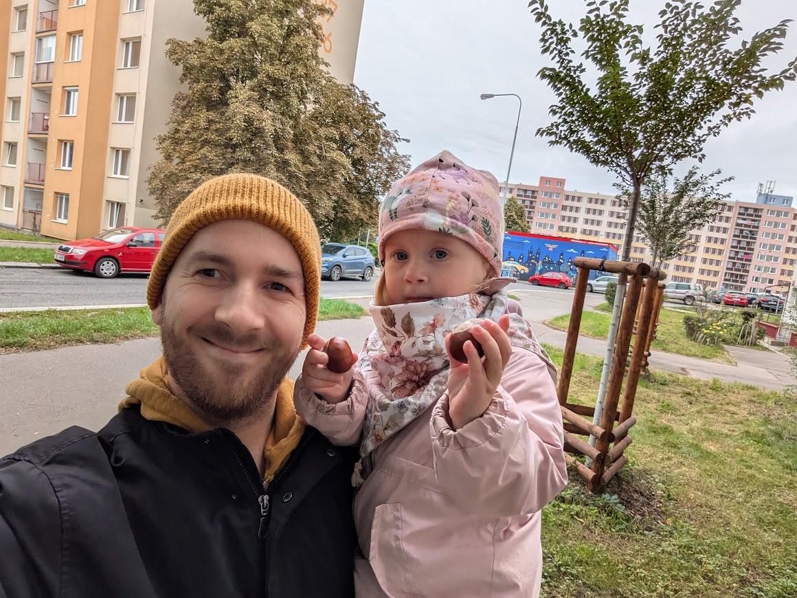 Patrik holding his daughter after recovery, finally home